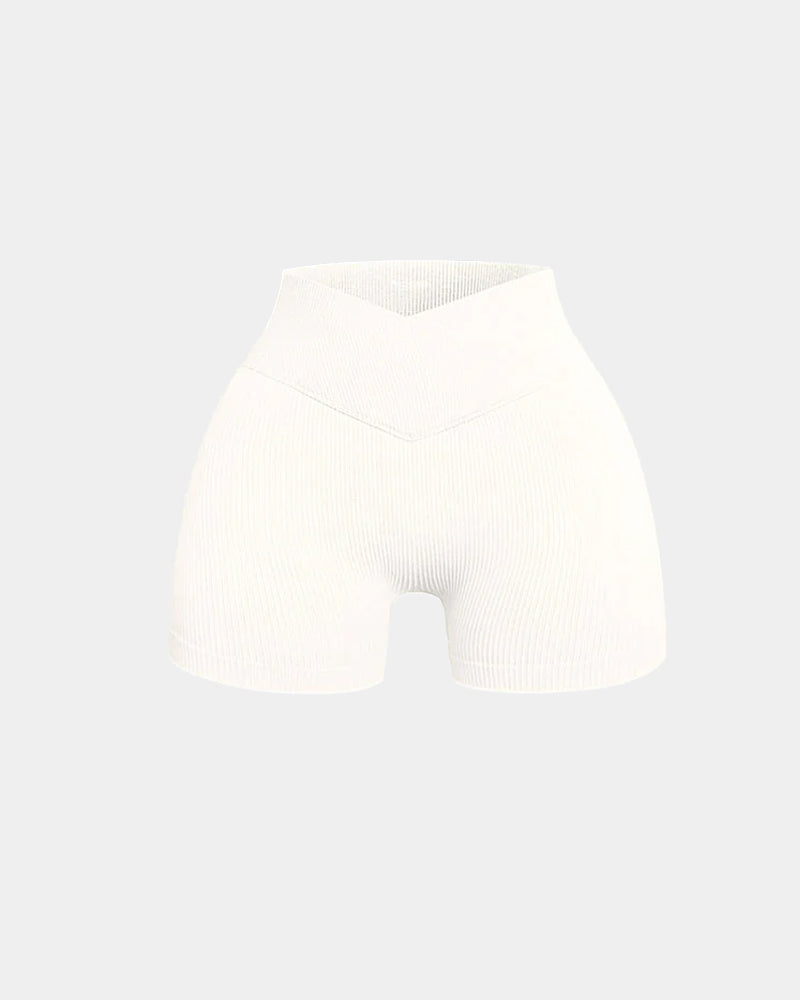 Shorts deportivos de yoga ajustados de cintura alta y canalé en color sólido