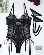 Body de encaje floral transparente con lazos laterales cruzados