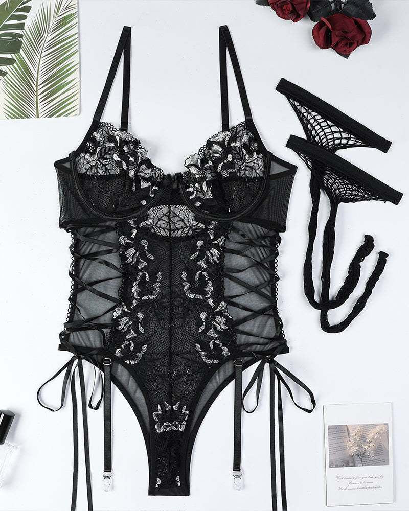 Body de encaje floral transparente con lazos laterales cruzados