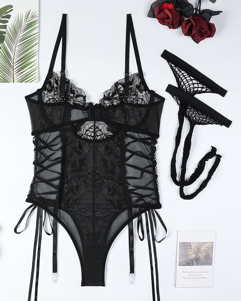Body de encaje floral transparente con lazos laterales cruzados