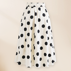 Bañador de una pieza y falda con decoración de lazo en blanco y negro