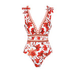 Traje de baño de una pieza con escote en V, cordones y falda estampada