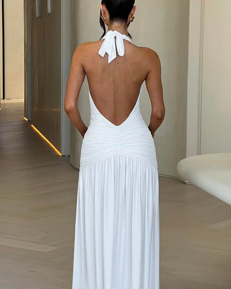 Vestido de vacaciones blanco con escote en V profundo, espalda descubierta, fruncido y abertura en el muslo, estilo halter